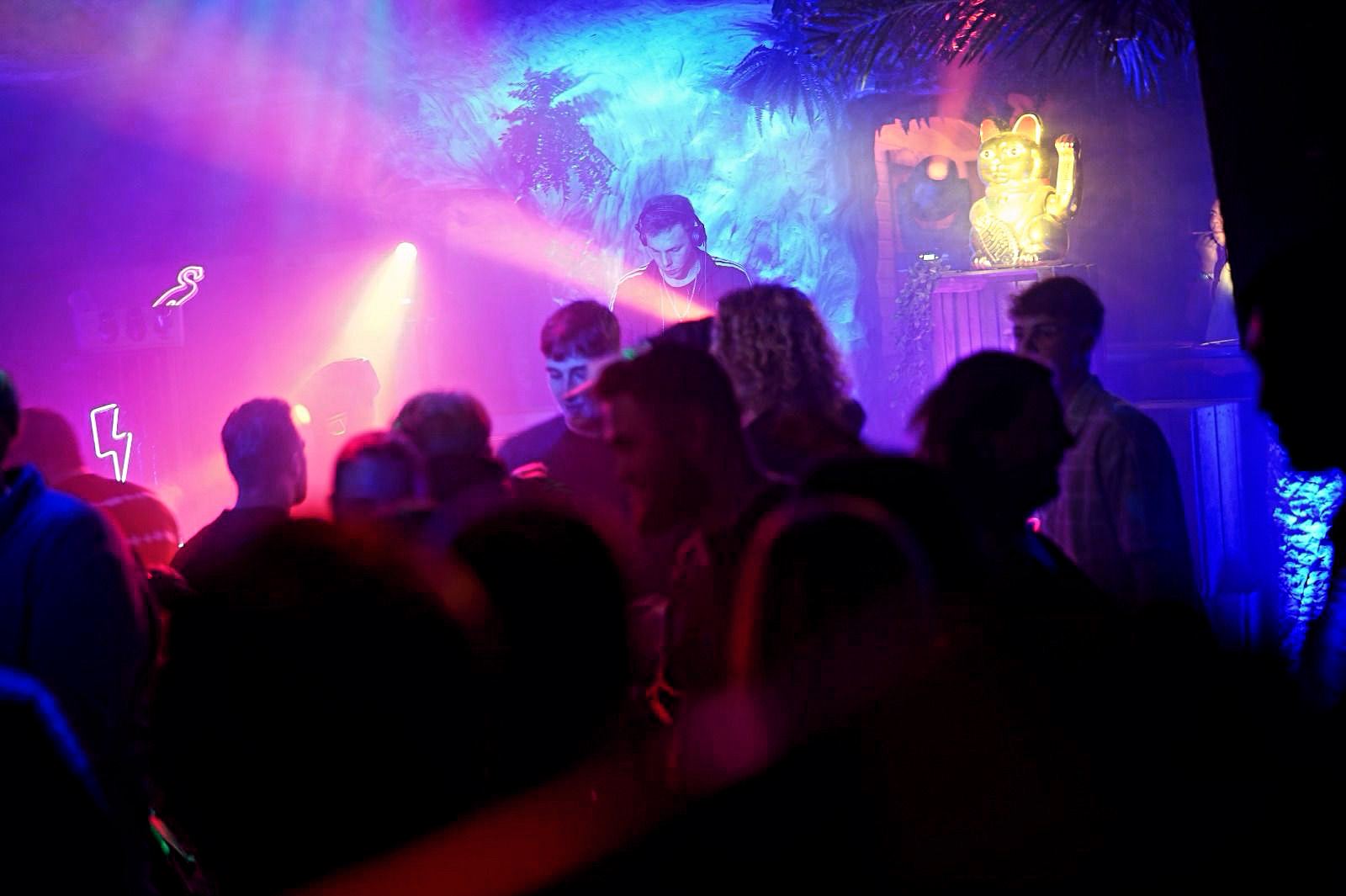 Crowd in front of the DJ booth